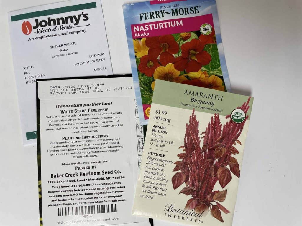 4 seed packets showing seed quantity
